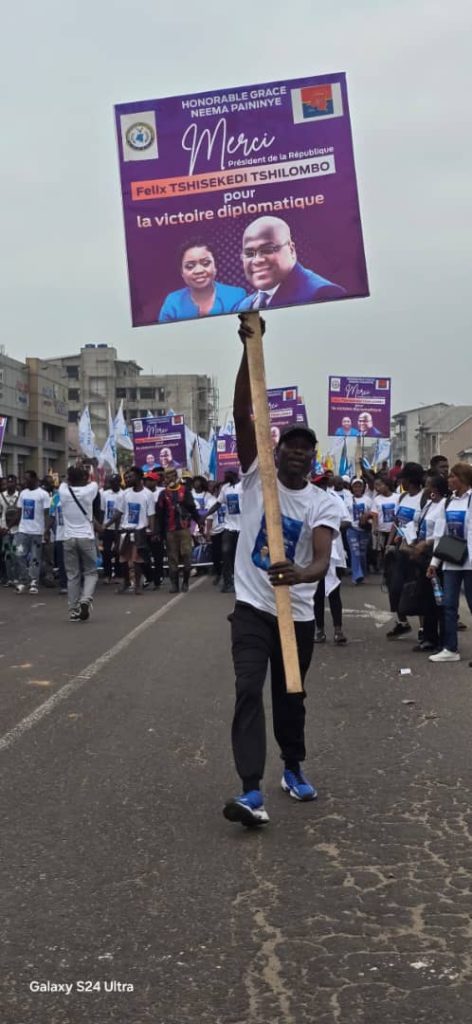 1003142336-472x1024 Accord de paix RDC-Rwanda: Grâce Neema Paininye était en marche de soutien avec l'Union Sacrée de la Nation ce mardi